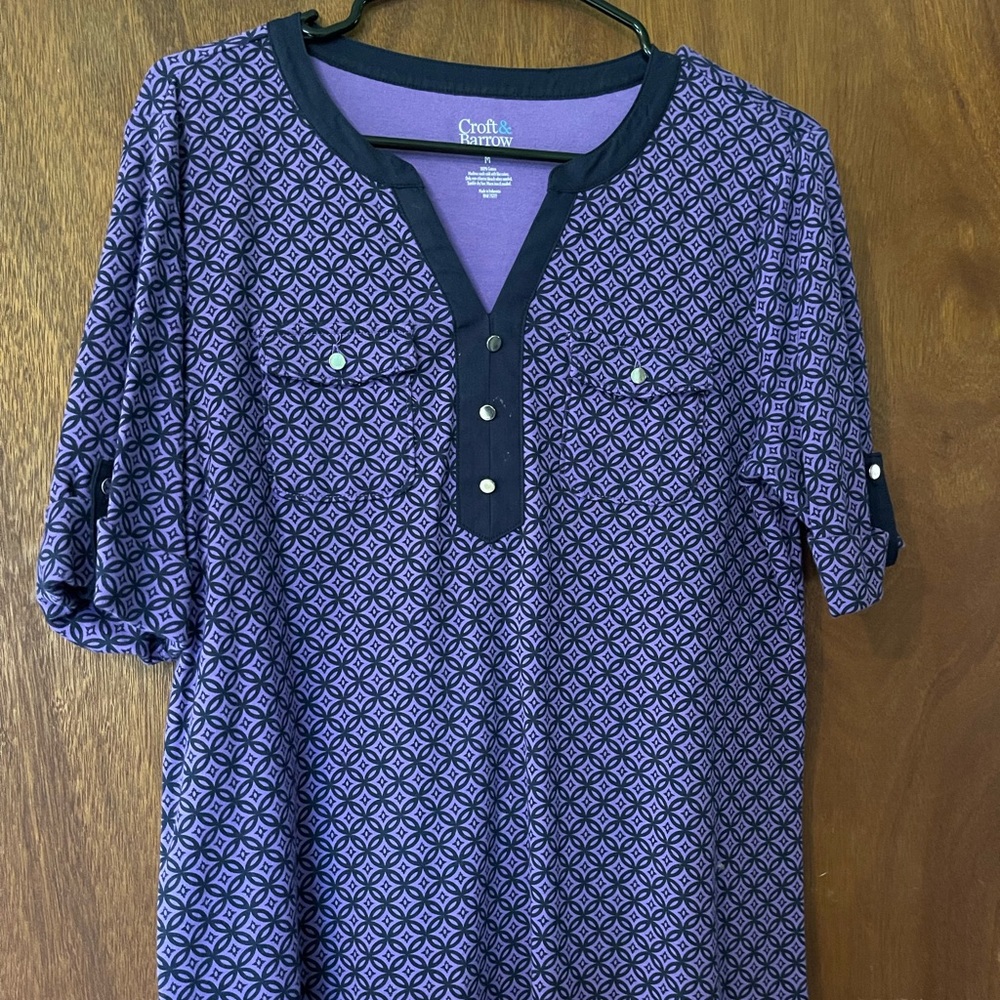 Short sleeve woman’s shirt, size Medium.  Purple and black with silver buttons